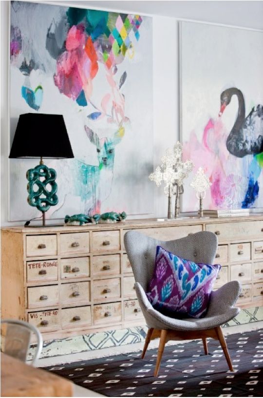 a light-colored wood apothecary cabinet makes an unusual statement