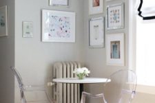 16 a small breakfast space with a round table and acrylic chairs looks airy and very comfy