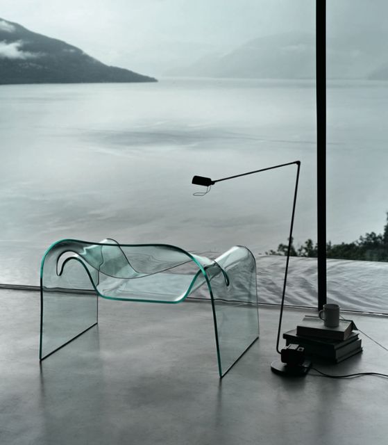 a clear glass chair won't spoil the view and will let you relax in peace and enjoy the look