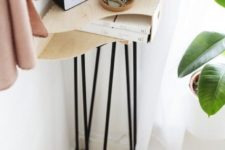 18 a small side table on hairpin legs used in a small corner to make the use of it