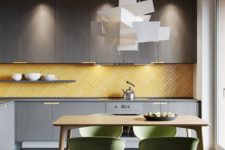 19 a minimalist moody grey kitchen with a sunny yellow tile backsplash clad in a diagonal way