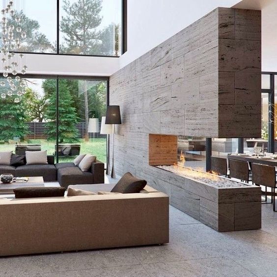 a half wall with a glass fireplace integrated is another great feature for an open layout