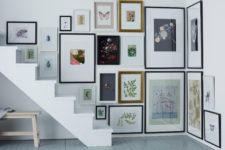 25 a staircase corner is fully taken with artworks and looks very spectacular, what a great idea