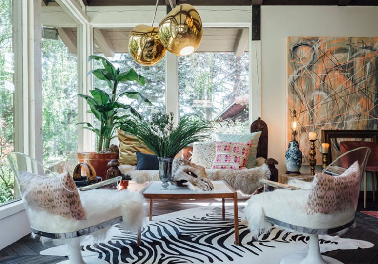 This amazing living room is in the eclectic home with a touch of Gothic and it looks amazing
