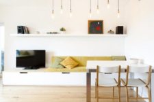 01 This chic apartment was done in minimalist style, with an airy feel and colorful touches