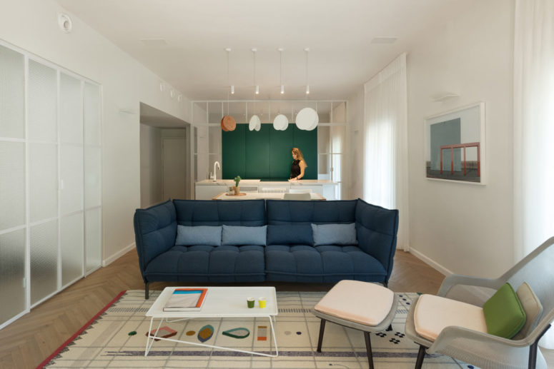 This modern apartment is renovated in a 1930s Bauhaus building and it got a chic modern look and was filled with light