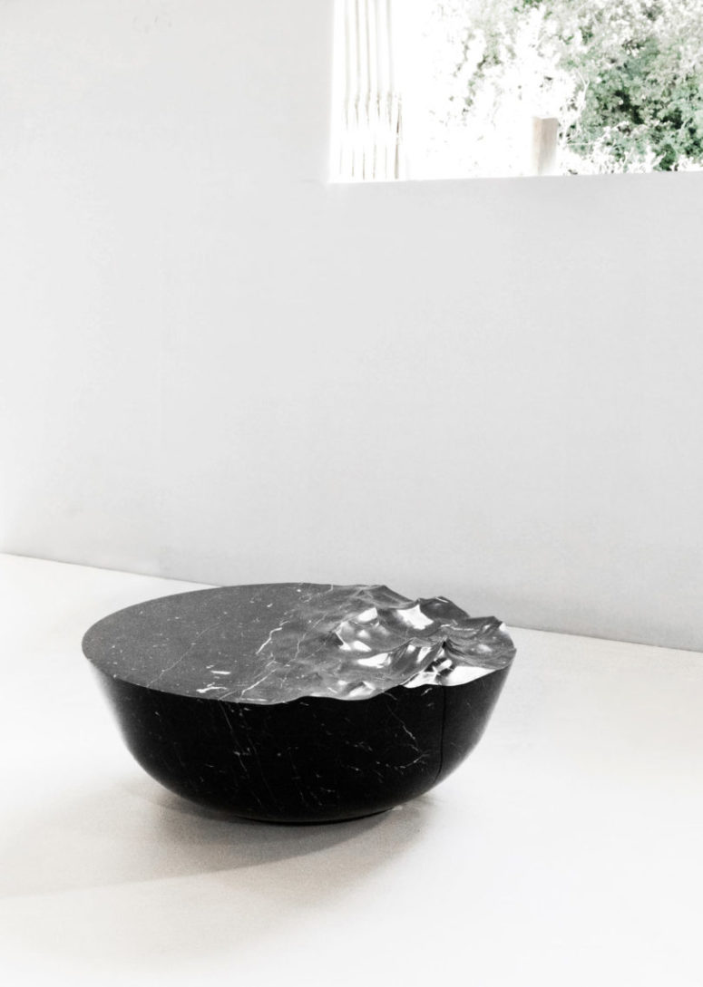 Such a coffee table was designed digitally, and it's sure to make a cool statement in any modern space