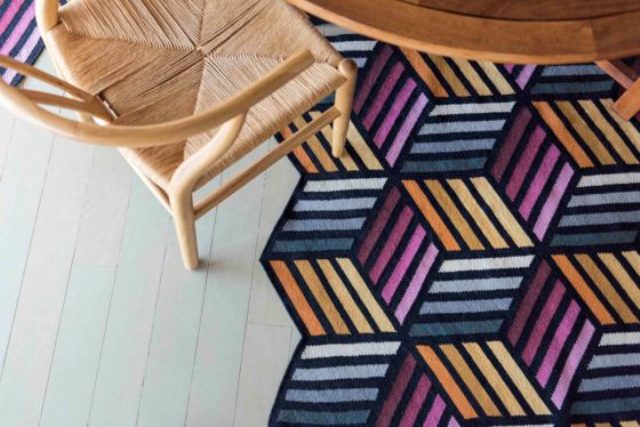This is Parquet Hexagon rug in shades of grey, yellow and pink