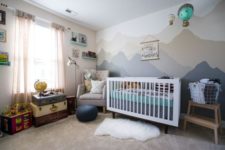 06 adventure-inspired nursery in grey and green shades with lots of fun decor