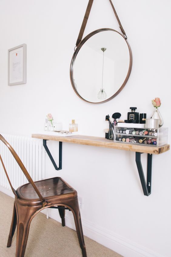 a narrow wooden shelf can act as a vanity if you don't have much space