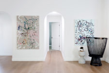 08 Colorful modern artoworks add a chic touch to the space