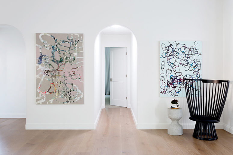 Colorful modern artoworks add a chic touch to the space