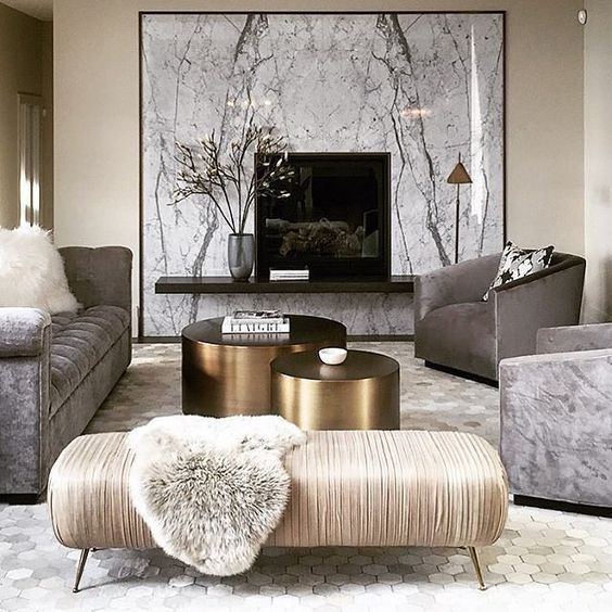 a glam space can be done in grey, creamy shades, with a black statement and shiny metals