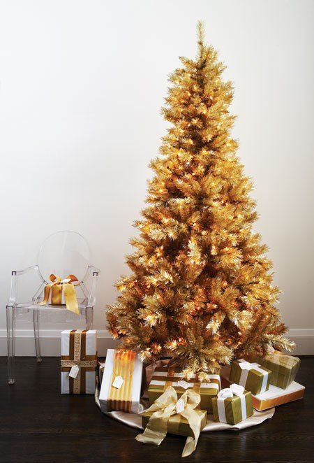 a gold pre-lit Christmas tree doesn't require any ornaments or decorations as it's bold itself