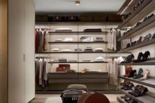08 a luxurious modern closet with open shelving and a large wardrobe is great for both men and women