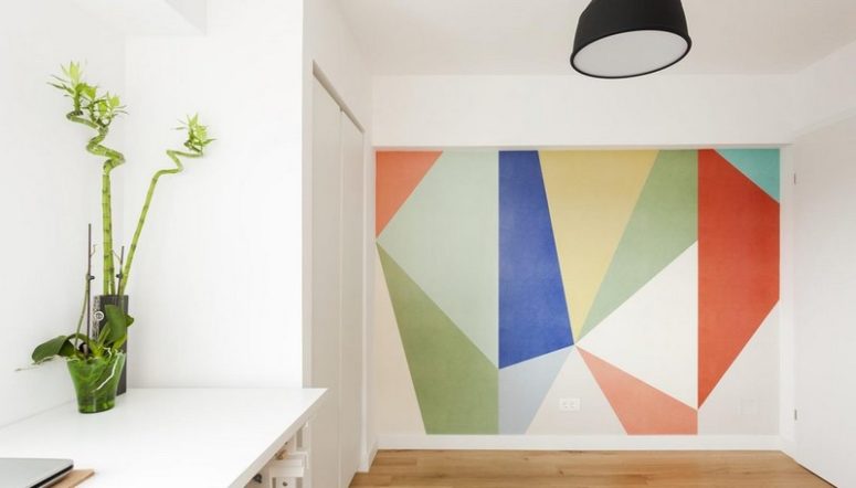 There's a bold geometric wall in here, and some bamboo that enlivens the space