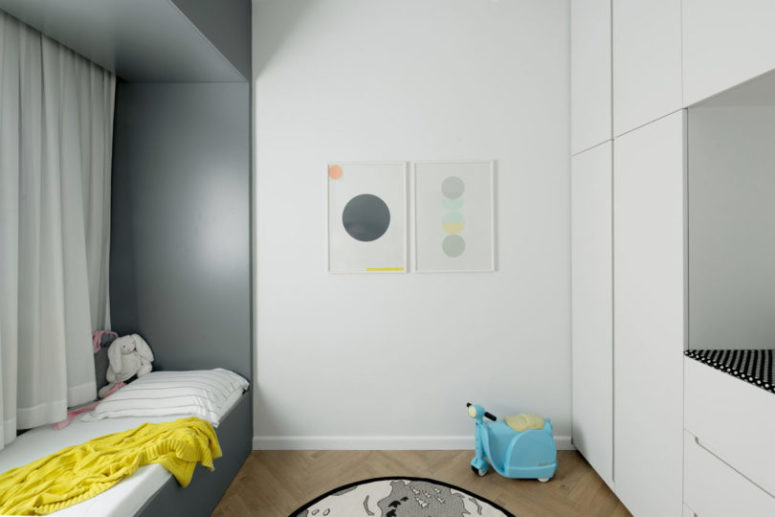 There's not much space in the kid's room but a lot of storage space