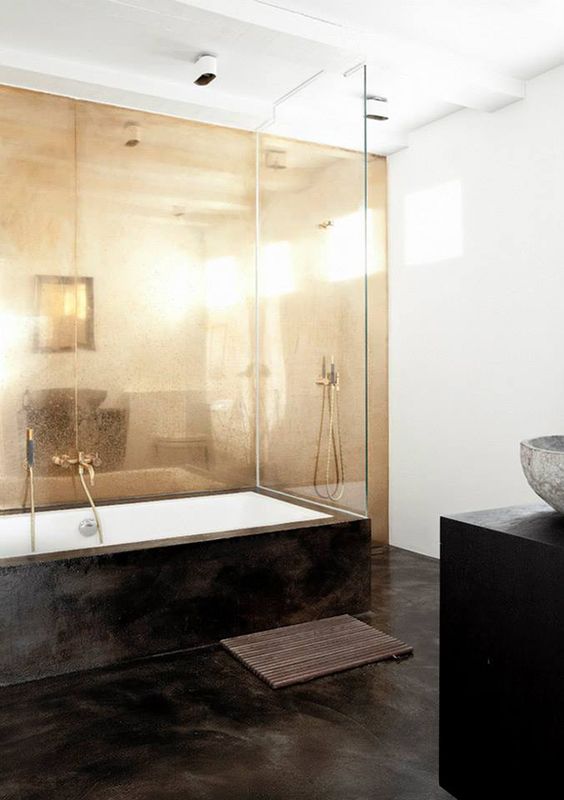a shiny copper wall will make a monochromatic bathroom more interesting and glam