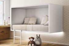 11 a unique white box suspended bed with a ladder for a minimalist kid’s room