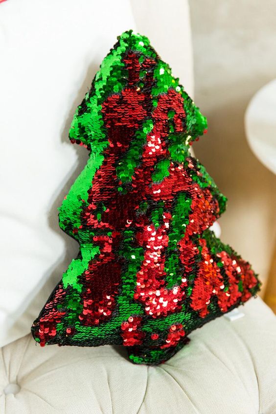 a reverse sequin red and emerald sequin Christmas tree pillow is sure to catch an eye