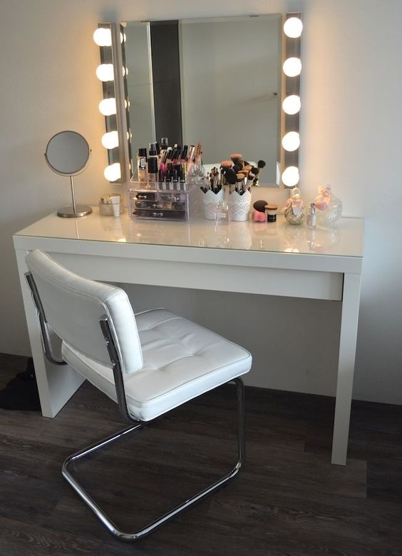 a usual modern mirror with much light on each side