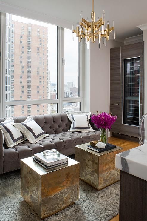 add glam touches with such chic brass square cubes and a chic brass chandelier