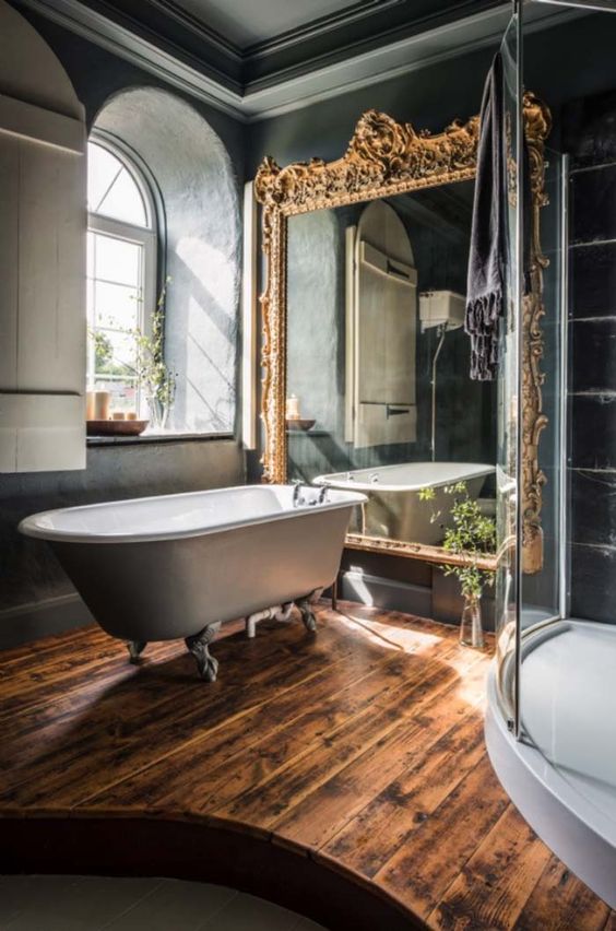 an oversized mirror in a luxurious vintage frame is great to add a glam feel