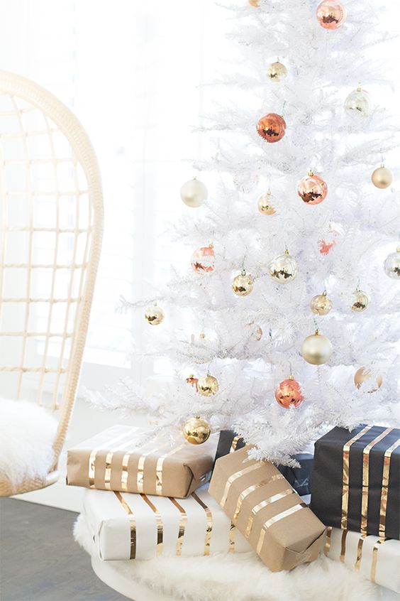 cute gold, copper and glitter ornaments will make your white tree more special