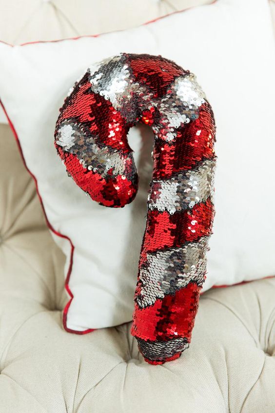 reverse sequin candy cane pillow in red and silver is a great idea to add a whimsy touch