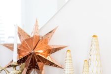 19 gold and copper Christmas decor – Christmas trees and a large star
