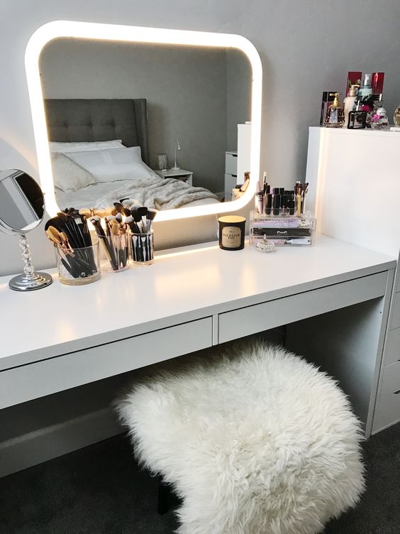 a mirror with integrated lights in the frame is a super functional and modern idea
