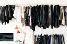 25 a man’s makeshift closet is placed in the home office makes it unique and creative