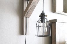 26 a wood and metal wall sconce that combines and pendant lamp and a sconce in one
