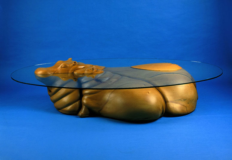 Hippo Table is part of the collection called Water Tables, which portrays various animals and even people in the water