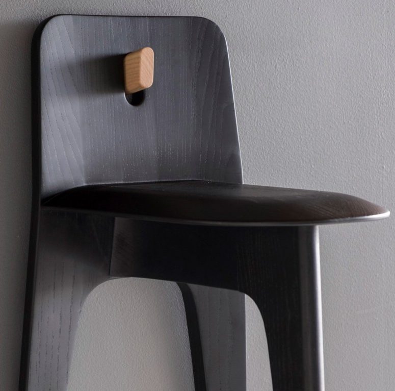 Minimalist Three-Legged Stove Chair That You Can Hang On A Wall