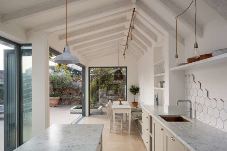 Airy White Kitchen With Various Textural Touches