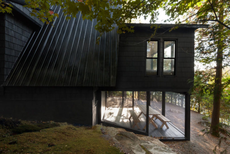 There's a partly outdoor dining zone with benches and a dining table it's fully glazed and can be opened to outdoors There's a partly outdoor dining zone with benches and a dining table - it's fully glazed and can be opened to outdoors