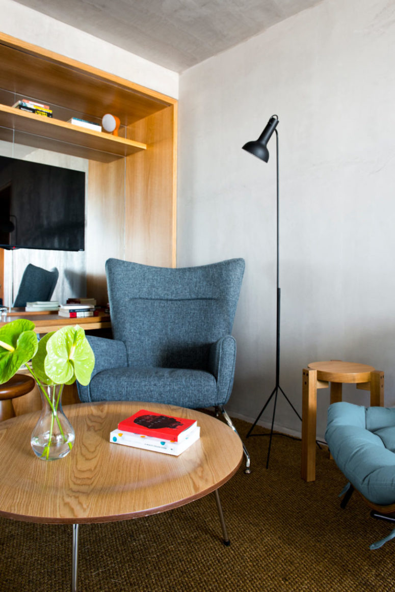 The wide use of light-colored wood makes the spaces cozier