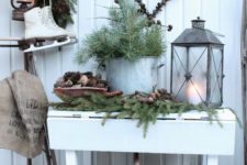 03 lush evergreens with pinecones, evergreens in a pot and a candle lantern
