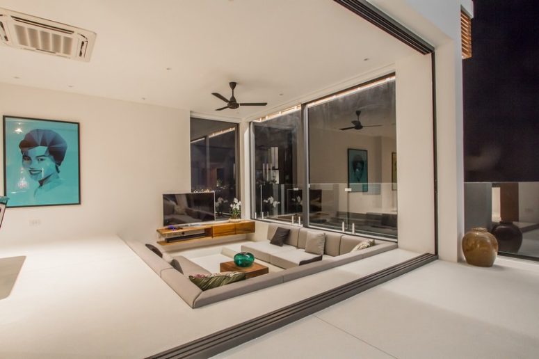 The living room features a sunken zone in front of the TV - it's a nod to conversation pits that are making a huge comeback