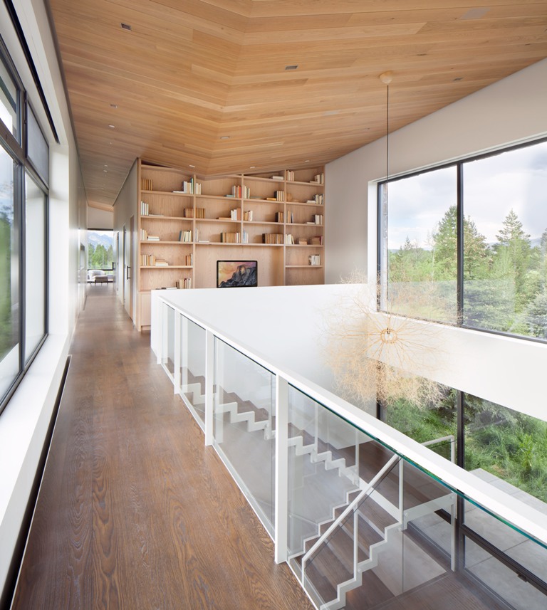 Some spaces have double height ceilings, and there's a library upstairs in one of the volumes