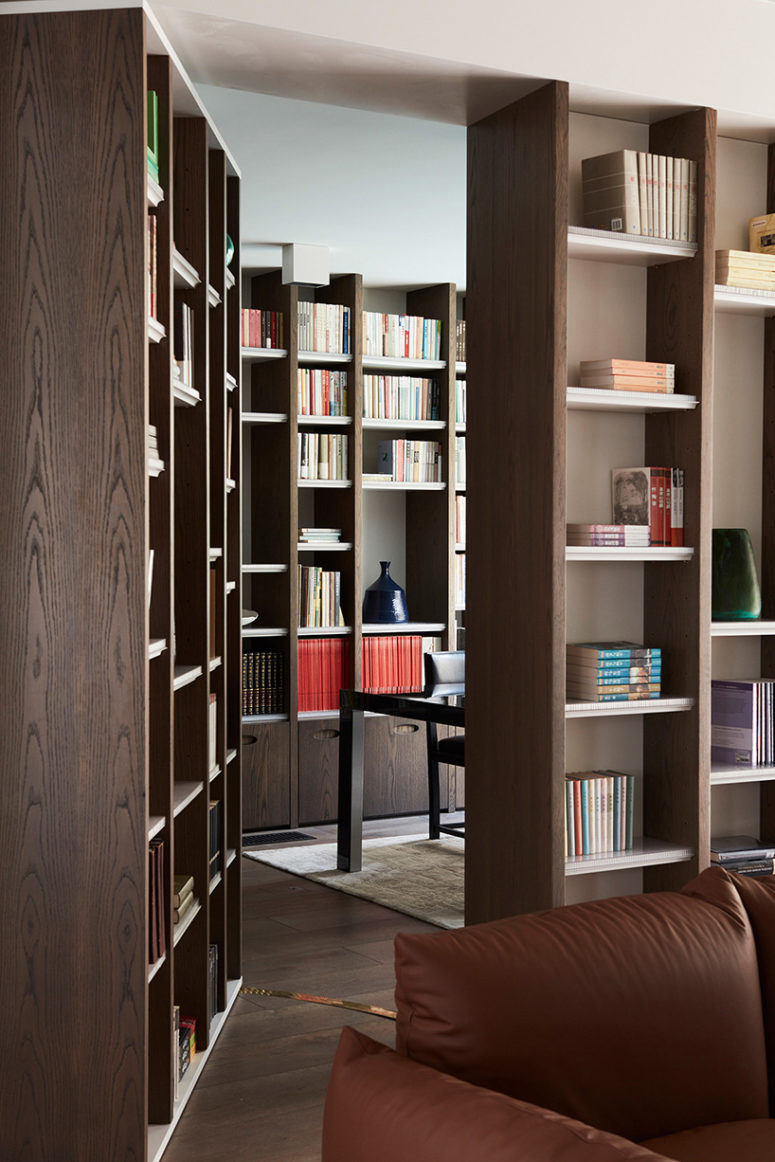 home library design The study's walls are completely covered with bookshelves, that's why the house is called Books