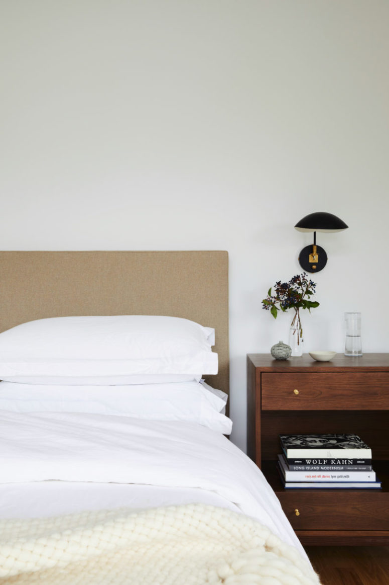 Elegant black and brass lamps throughout the house highlight the decor