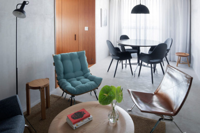 The furniture is modern and comfy, all these zones allow to cimmunicate with guests while cooking or serving food