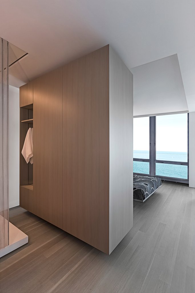 These wood panels are actually a wardrobe for owners' clothes and shoes