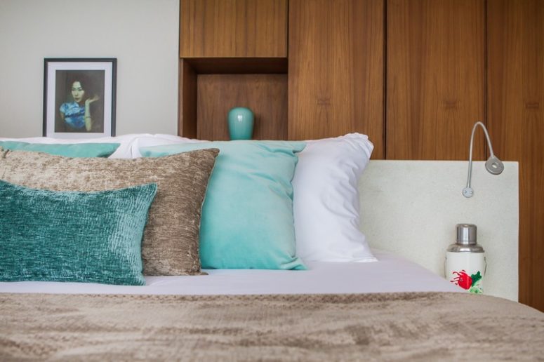 Turquoise, blue and purple are added as colorful accents to the spaces