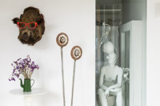 08 Sculptures and faux taxidermy can be seen throughout the space