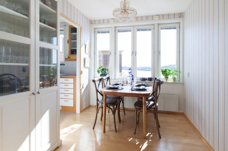 There's a separate dining room with a view and a vintage cupboard