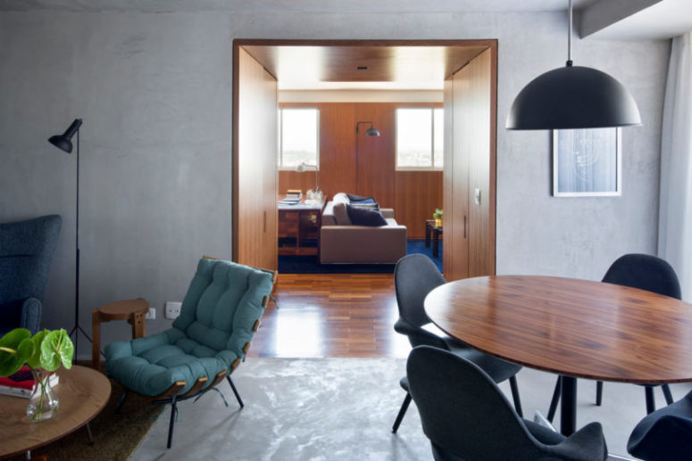 There's a wooden doorway to the home office and more private zones