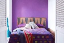 08 a violet wall for a statement in the bedroom and matching bedding for a bold look